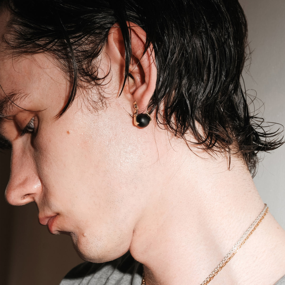 Strapped Ebony Orb Earring