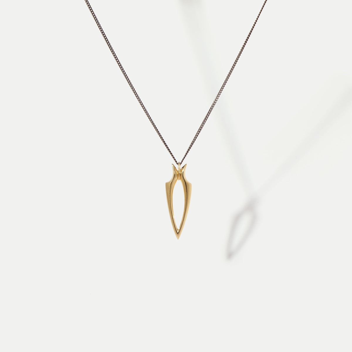 Stretched Spur Yellow Gold Pendant